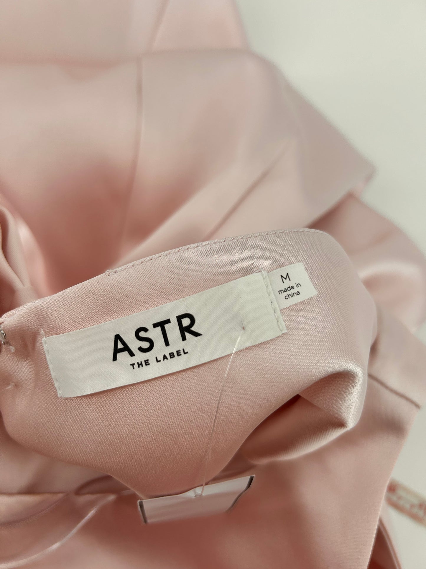 ASTR the label size M